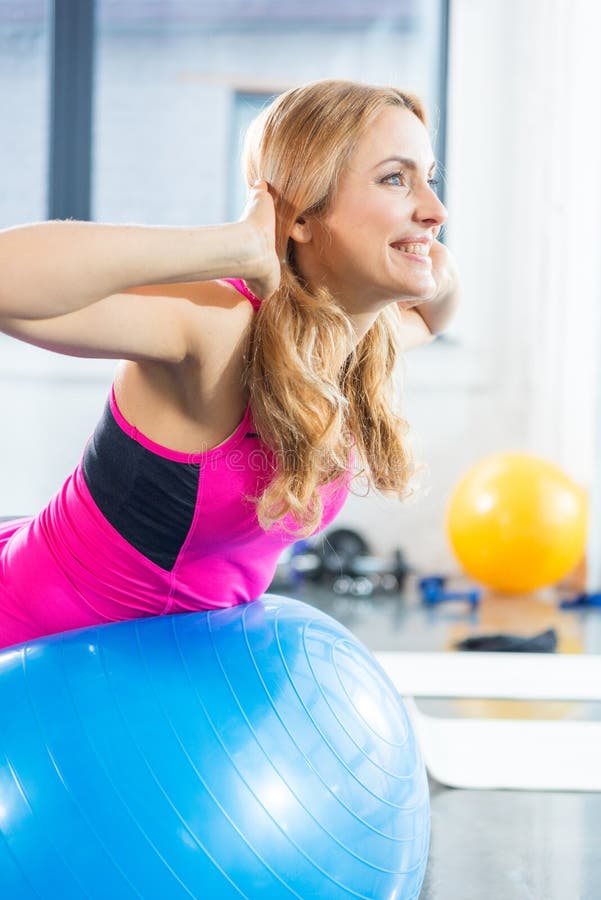 Smiling Blonde With Fitness Ball Stock Photo - Image of ...