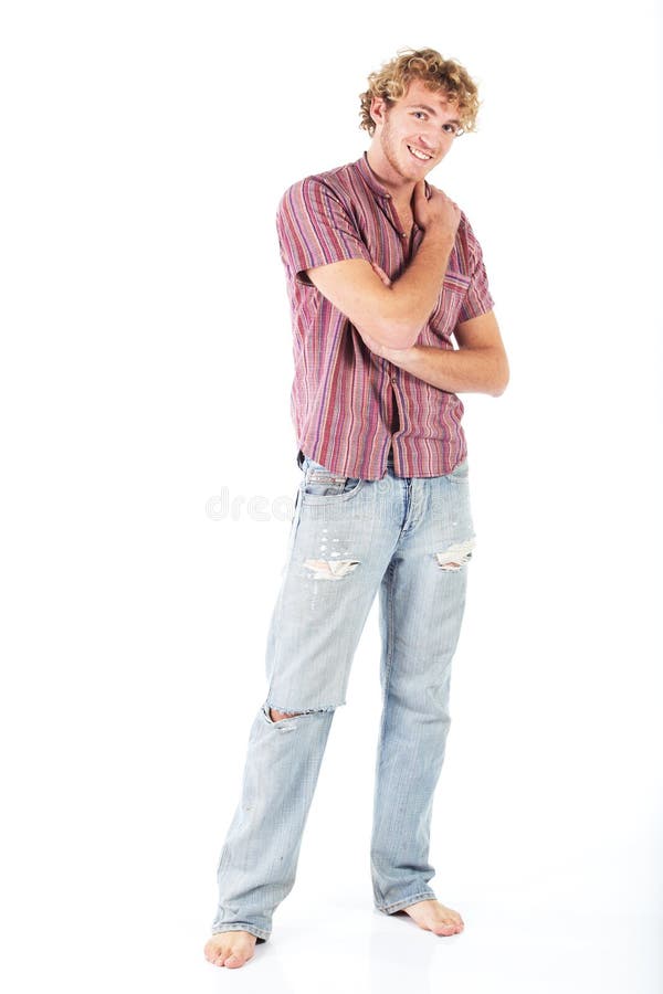 Young blonde adult caucasian man in casual clothes and scruffy beard on a white background. Young blonde adult caucasian man in casual clothes and scruffy beard on a white background.