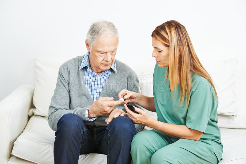 Blood glucose monitoring for senior man stock photography Blood glucose monitoring for senior man stock photography