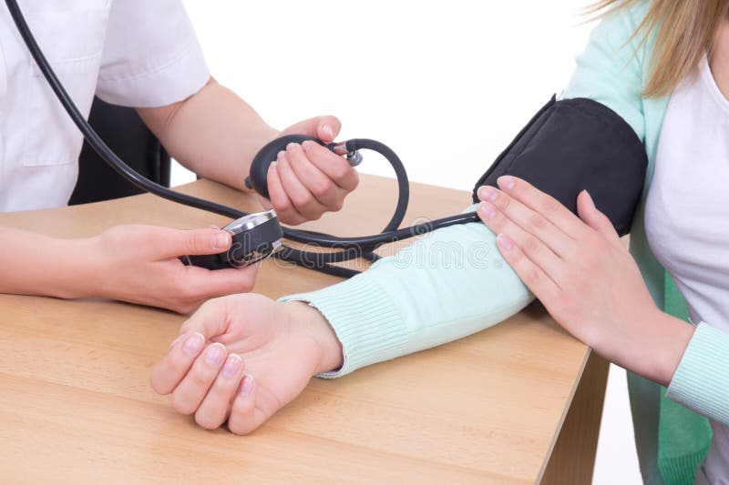 Blood pressure measuring in clinic stock photos