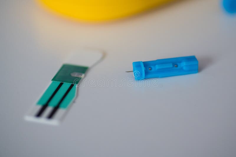 Blood Test Strip and Lancet for Glucose Self Test Stock Image Image