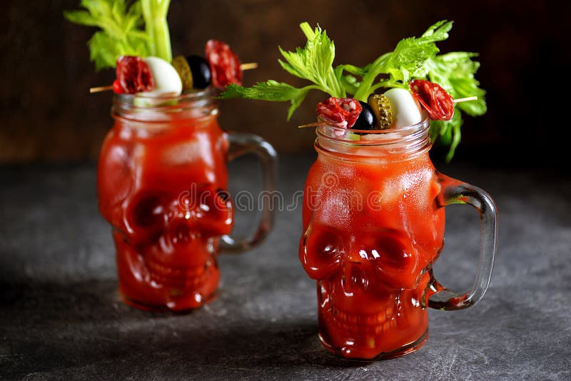 https://thumbs.dreamstime.com/b/bloody-mary-cocktail-glass-skull-celery-sticks-pink-salt-lime-canapes-canned-vegetables-halloween-drink-bloody-171820741.jpg
