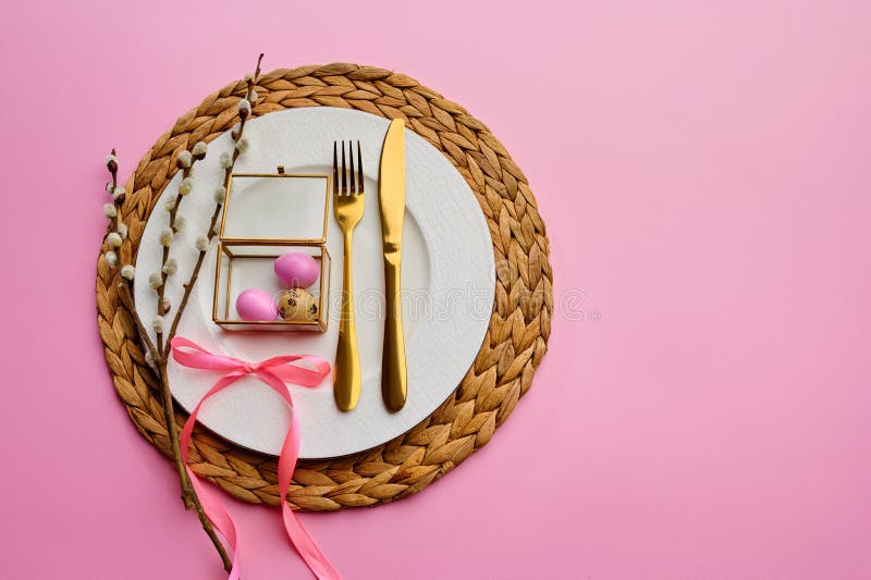 Blooming willow, easter egg on plate and tableware stock photo