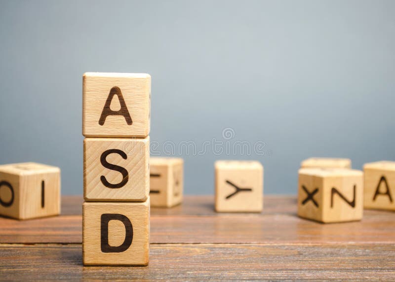 Wooden blocks with the word ASD - Autism Spectrum Disorder. Neurological and developmental disorder. Wooden blocks with the word ASD - Autism Spectrum Disorder. Neurological and developmental disorder.