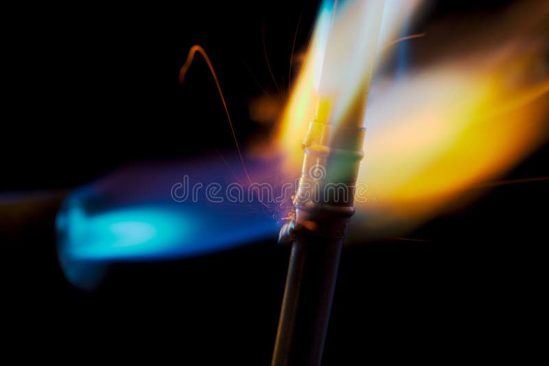 Blow Torch Flame and Copper Pipe