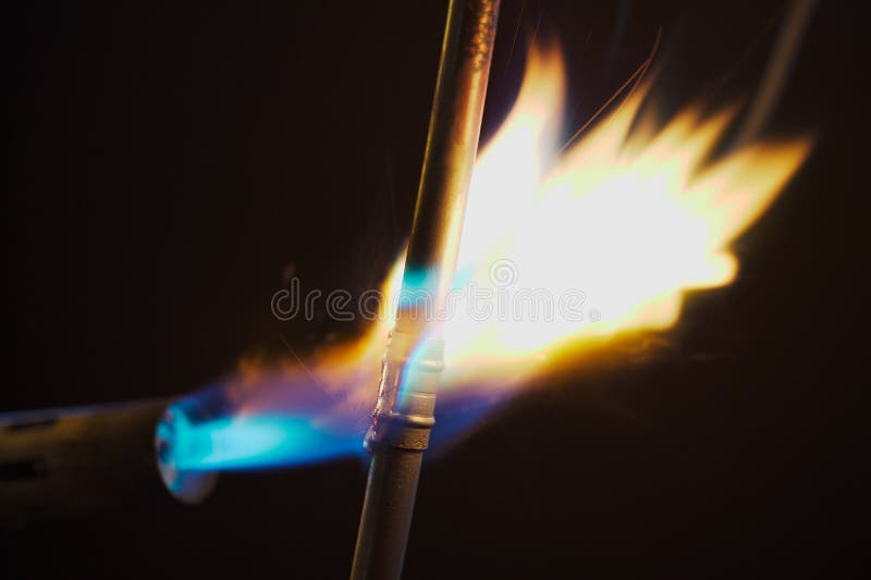 Blow Torch Flame and Copper Pipe