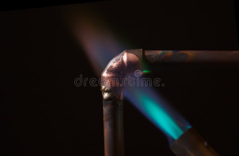 Blow Torch Flame and Copper Pipe