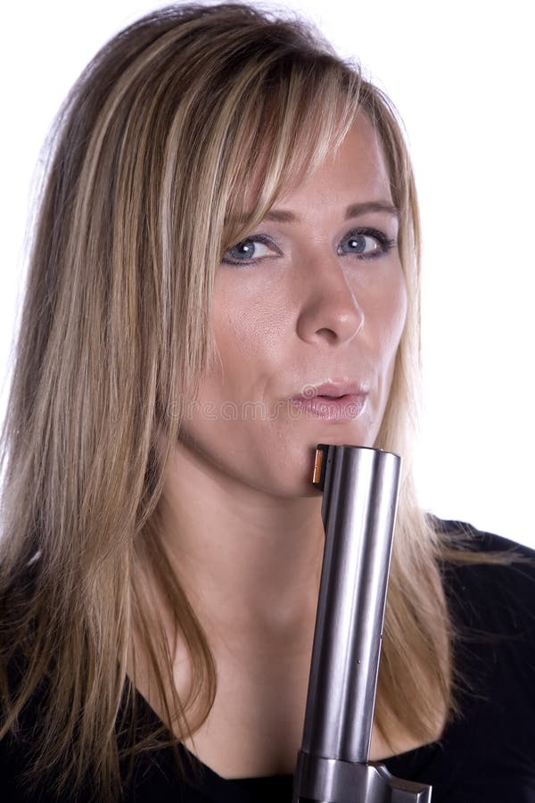 Blowing at End of Gun Barrel Stock Photo Image of attractive, hand