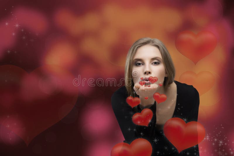 Girl in love blowing hearts in valentines day