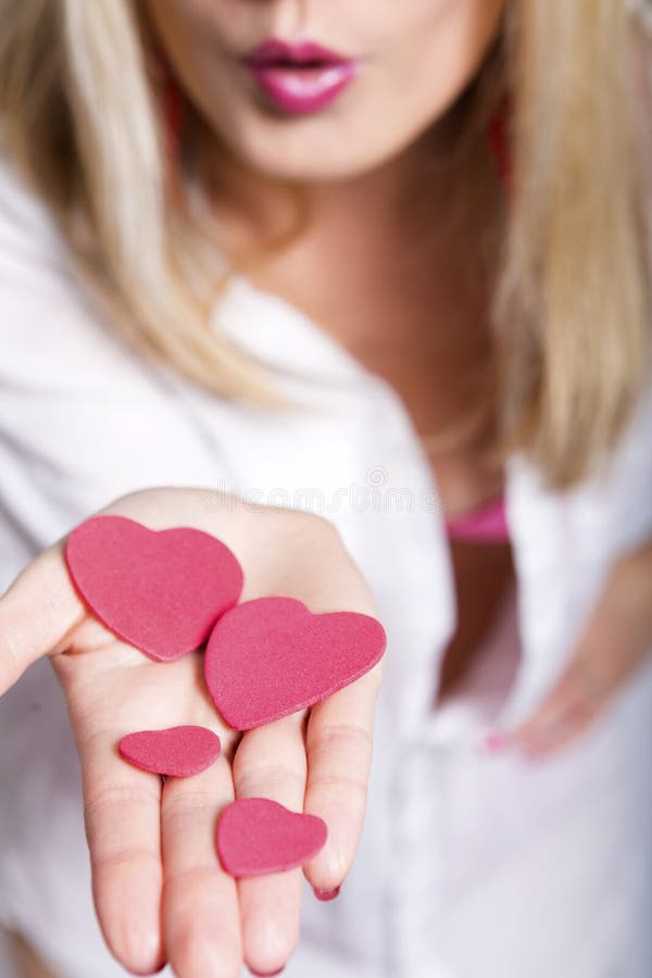 Blowing valentines kisses and hearts. Blowing valentines kisses and hearts