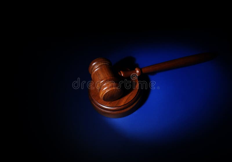 Judges court gavel on blue background. Judges court gavel on blue background