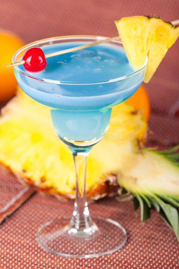 Blue Alcohol Cocktail with Pineapple and Cherry Stock Image Image of cocktail, color 11611841