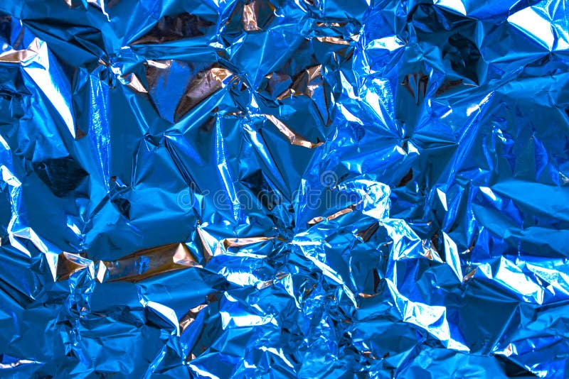 Blue Aluminum Cans On Factory Conveyor. Soft Drinks Or Beer Industrial