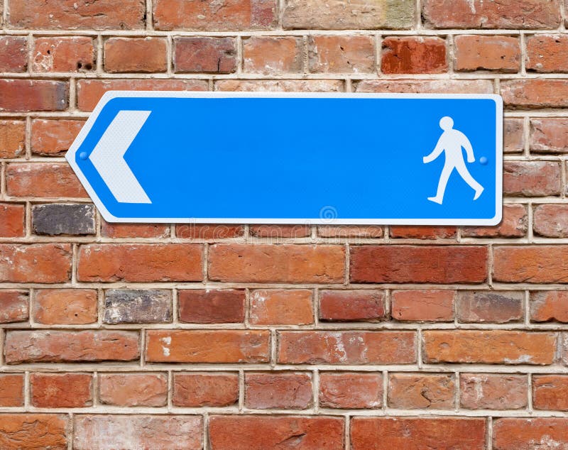 An image of a blue arrow road sign