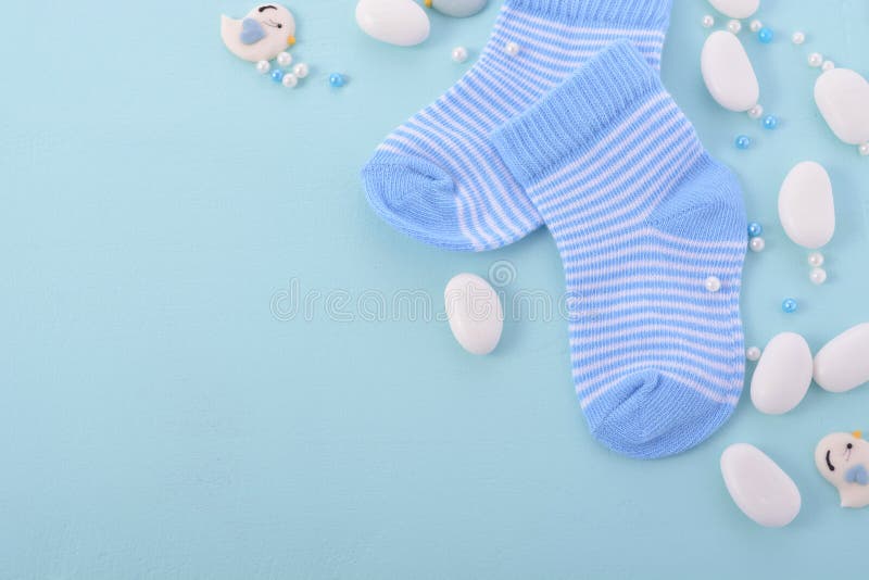 Its a boy, blue theme Baby Shower or Nursery background with decorated borders on pale blue wood background. Its a boy, blue theme Baby Shower or Nursery background with decorated borders on pale blue wood background.