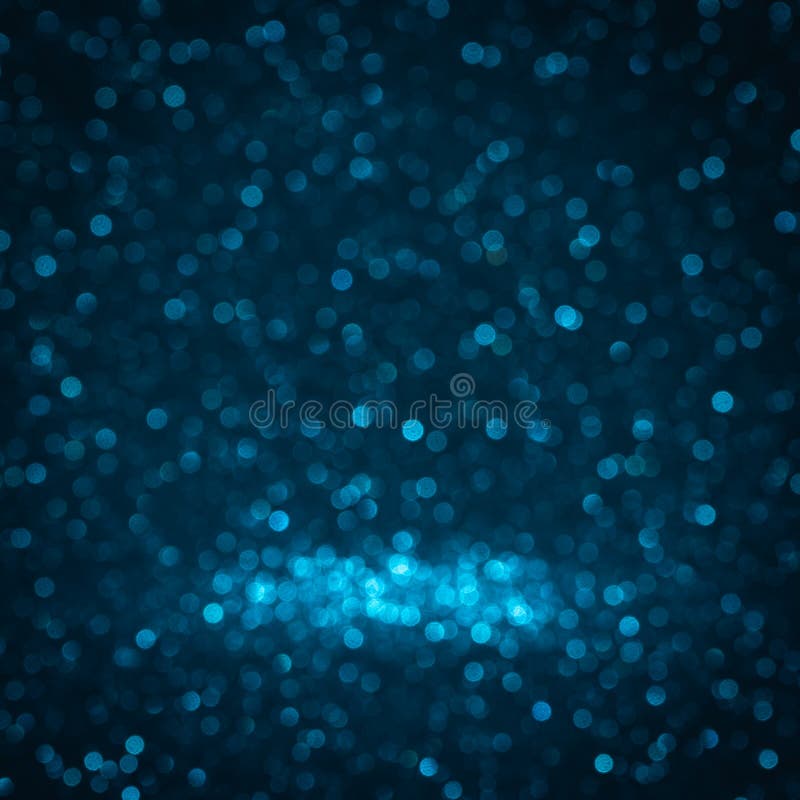 Blue background for christmas navy glitter sparkle. Abstract bokeh light shiny dark holiday.