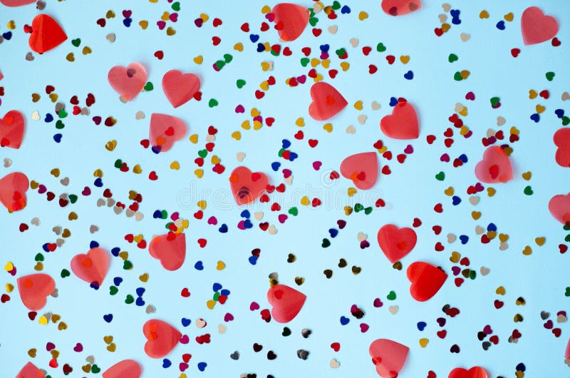 Blue background with small multicolored and big red hearts royalty free stock photography Blue background with small multicolored and big red hearts royalty free stock photography