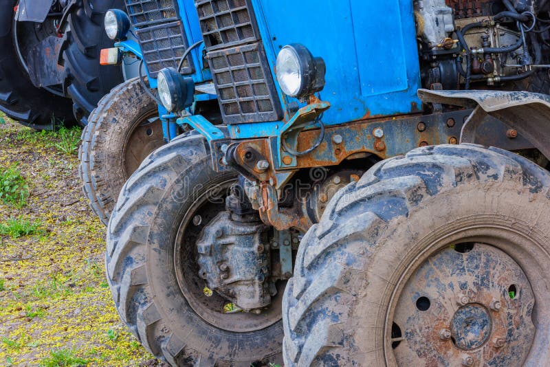 Blue Belarussian Tractors, Wheels and Opened Diesel Engine Compartment