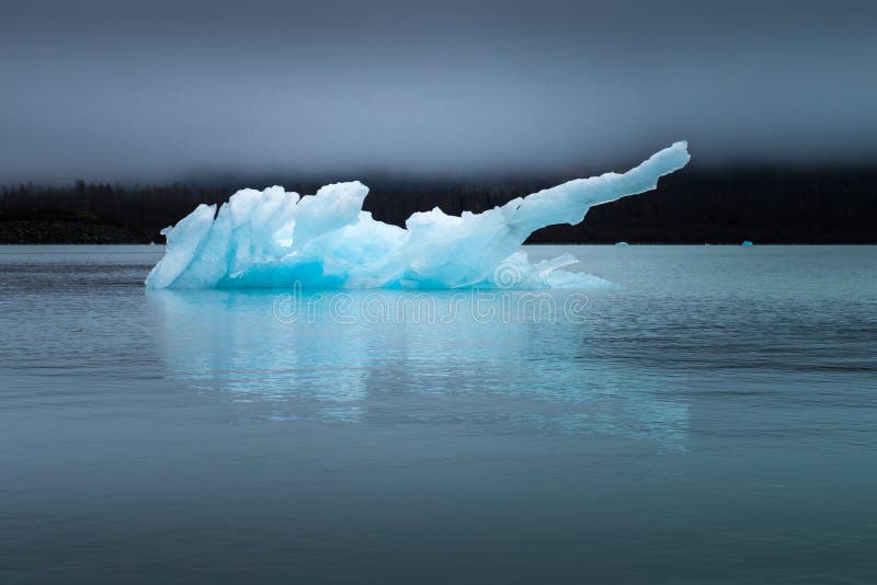 Blue Ice Berg on Lake in Alaska