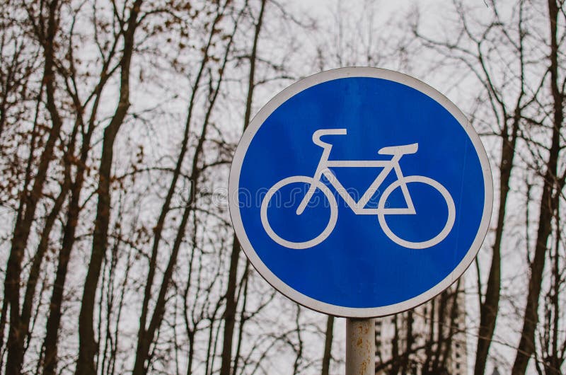 A Blue Bicycle Sign Sign Signifying a Bike Path. Stock Photo Image of recreation, drive 170319958