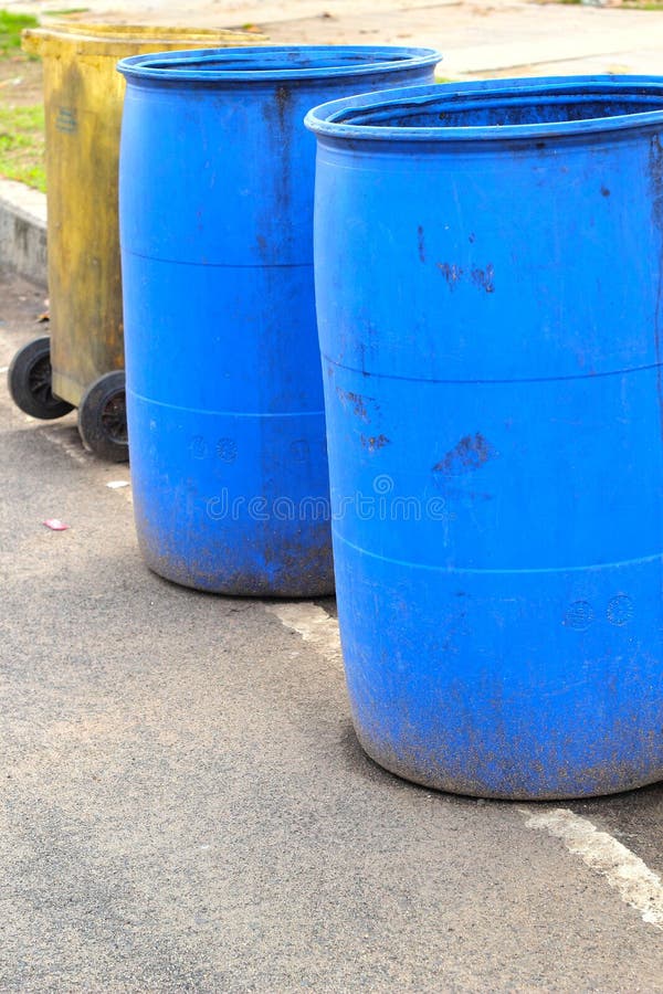Blue bins in the street. stock image. Image of collection 34098963
