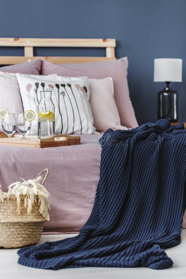 Blue blanket on bed stock photo. Image of home, blanket 99522660