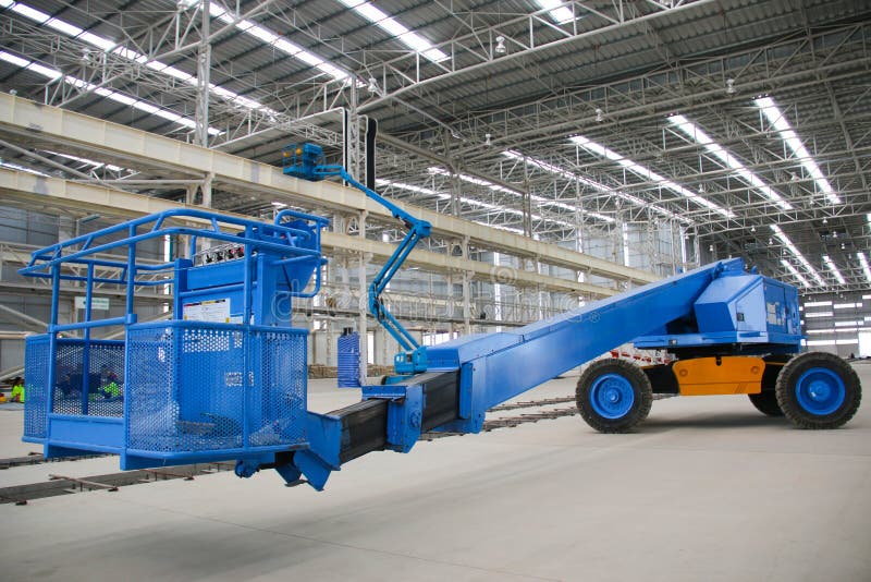 Blue boom lift perspective indoor