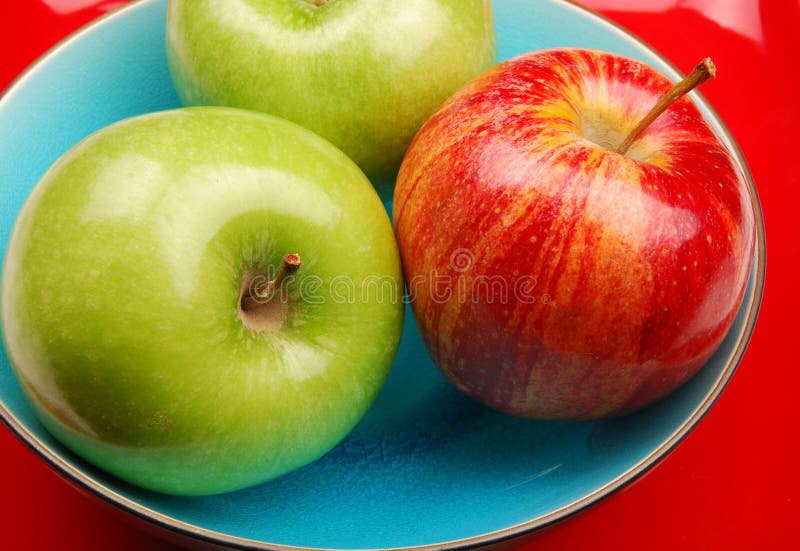 Blue bowl with apples stock photo. Image of juicy, fresh 3443422