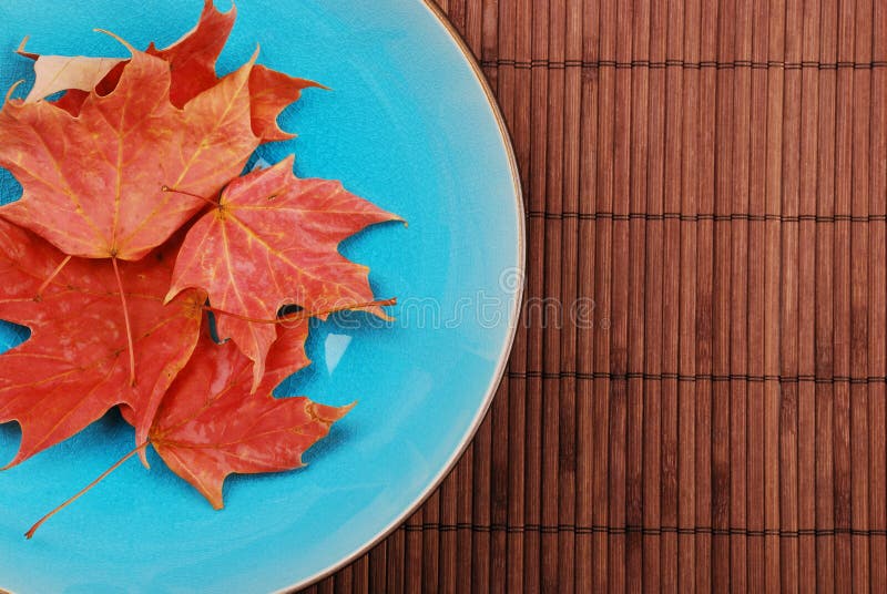 Blue bowl with leaves