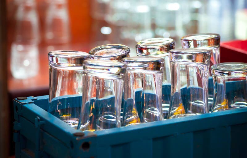 A Blue Box with Inverted Glasses on the Kitchen Bar Stock Photo Image