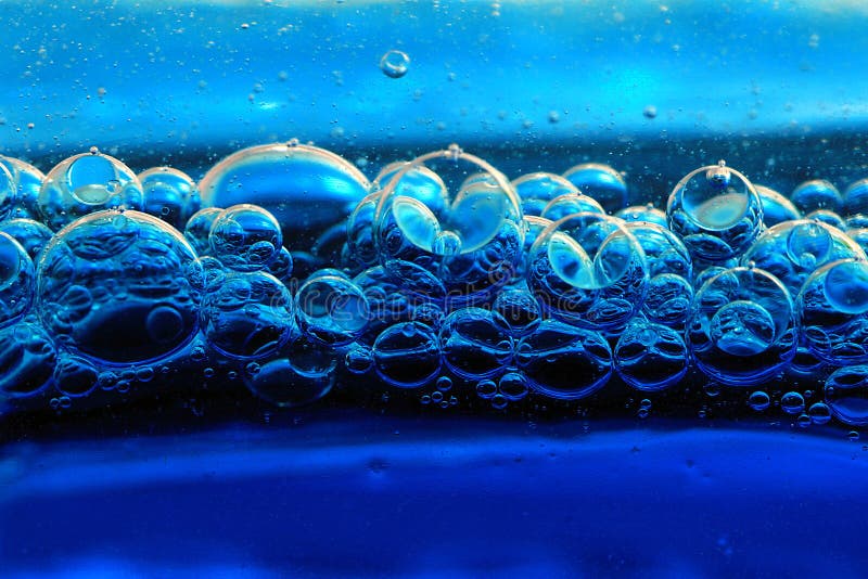 Blue bubbles stock image. Image of rainbow, soapy, surface 5550299