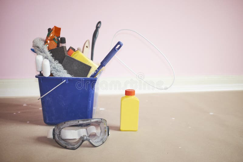 Blue Bucket Full of Cleaning Tools and Substances Stock Photo Image