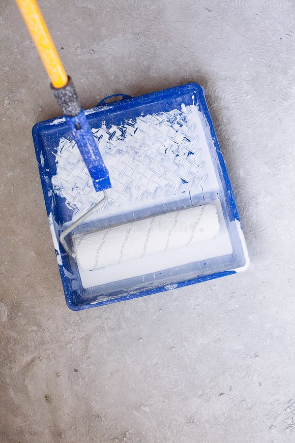 Blue Bucket with Paint and a Brush Roller Paint Tray Stock Image