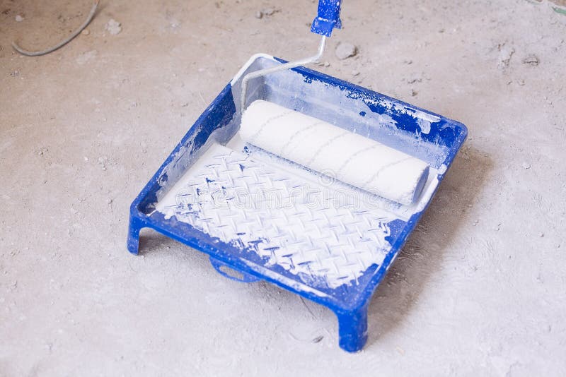 Blue Bucket with Paint and a Brush Roller Paint Tray Stock Image
