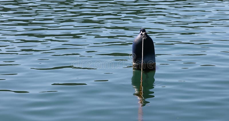 Old blue buoy stock footage