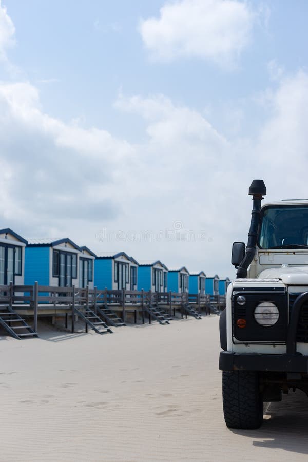 Blue Cabanas for Rent on a Sandy Beach with a 4x4 Stock Image Image