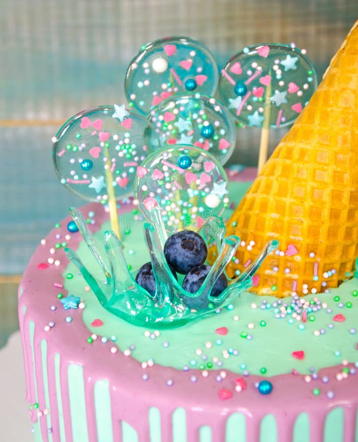 Blue cake with ice cream cone and caramel decoration