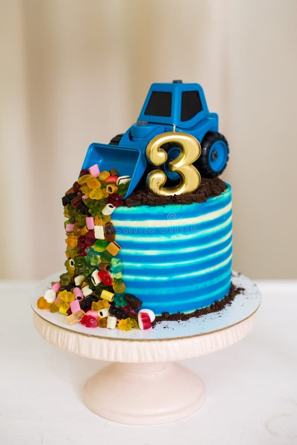 Blue Cake with toy tractor stock photo. Image of celebrate 166407806