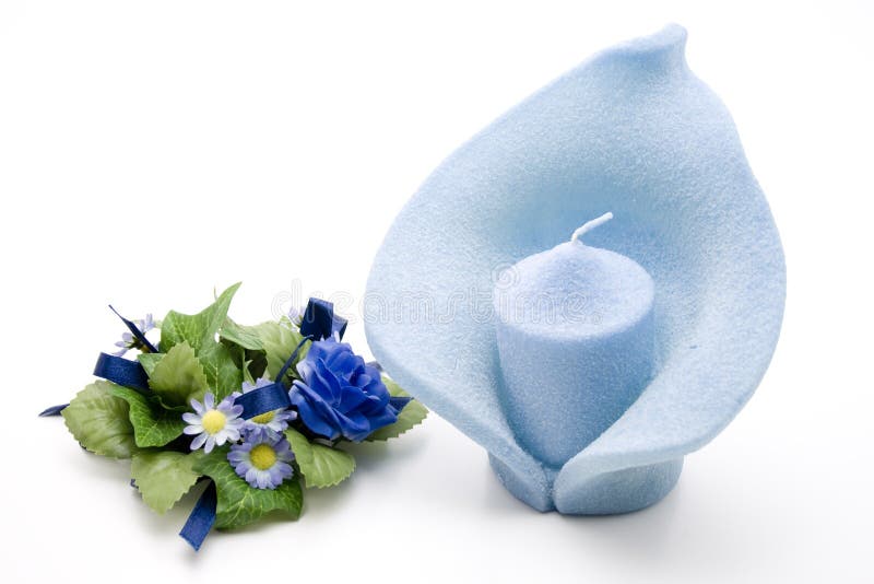 Blue candle with potpourri stock image. Image of wick 24003365