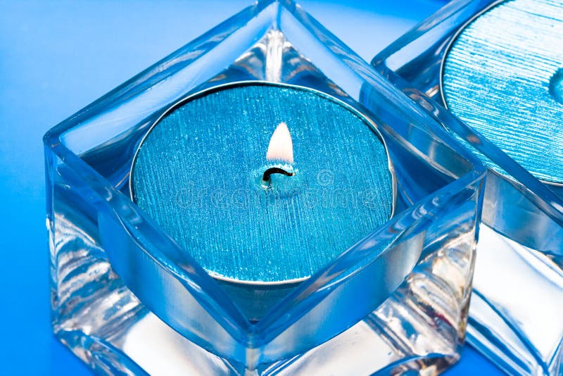 Blue candles in glass stock image. Image of fire, decoration 7162073