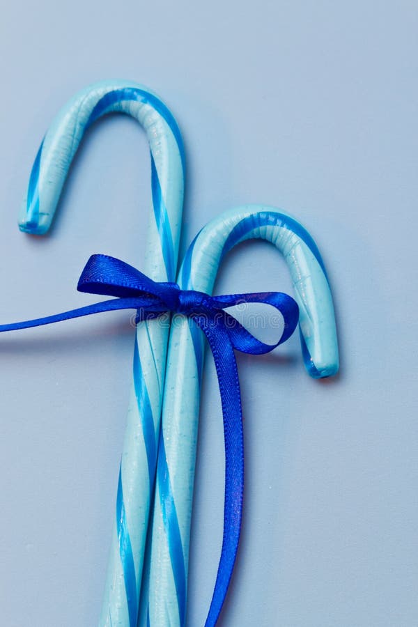 Candy cane with red bow stock image. Image of candy, background 28102451