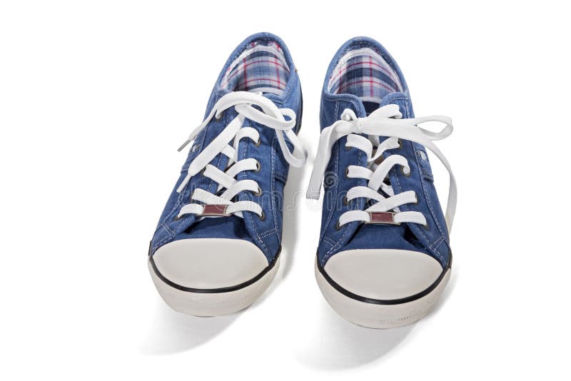 Blue canvas sneakers stock photo. Image of casual, isolated - 57996334
