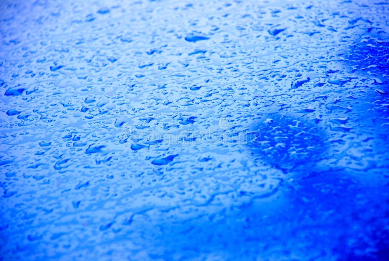 Blue car hood in the rain stock image. Image of rain, metal 4396997