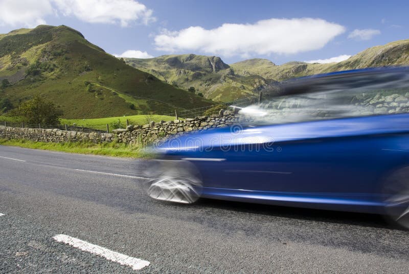 Blue Car Speeding, Lake District, UK Stock Photo Image of route, ride