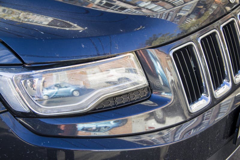 Car With Xenon Headlights Fast Drive On Road At Nigh Stock Image