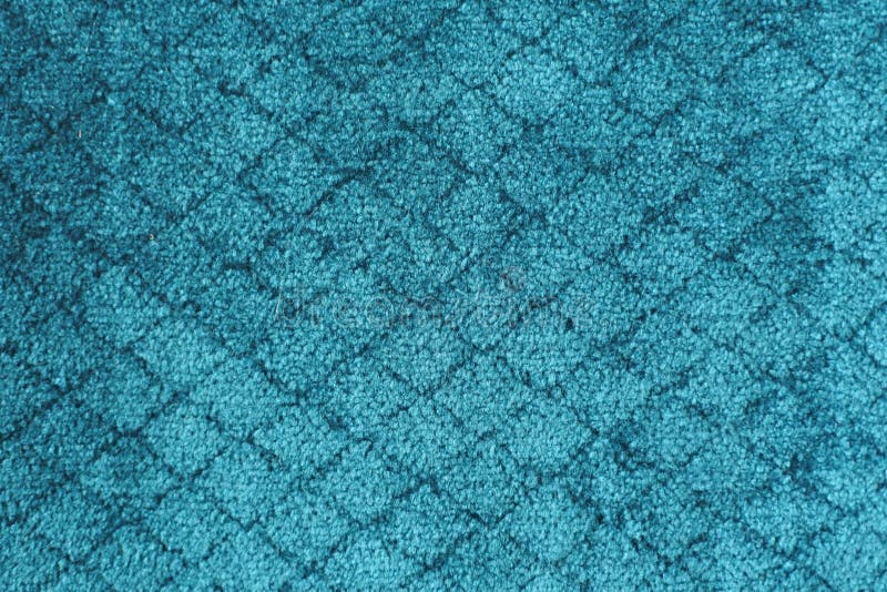 Blue Carpet with a Diamond Pattern. Scuff Marks on the New Carpet