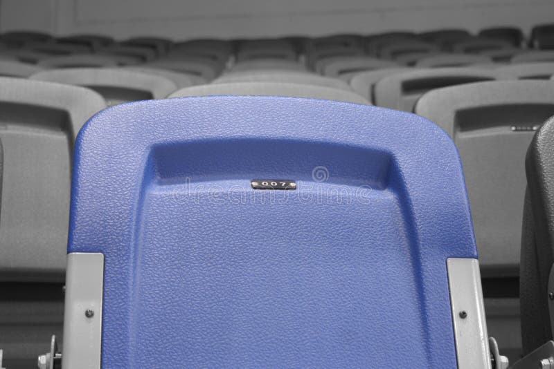 Blue chair on stadium reserved for 007