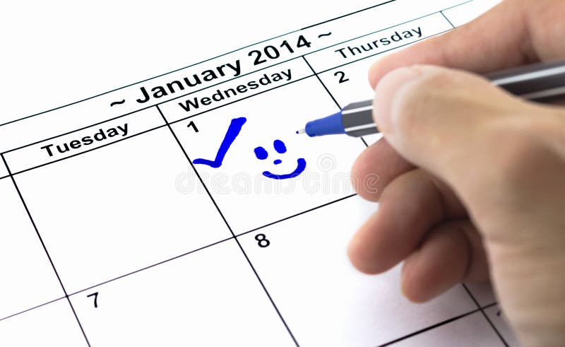 Blue check with smile. Mark on the calendar at 1St January 2014.