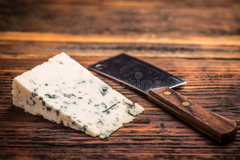 Blue cheese with nuts stock photo. Image of roquefort 62857614
