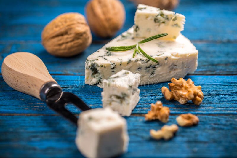 Blue cheese with nuts stock photo. Image of roquefort 62857614